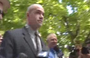 Tim DeChristopher walking to court.